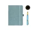 Light blue leather-covered notebook with rounded corners, matching elastic band, and pen loop, paired with an illustrated blue and yellow fountain pen and a floral 'joie' logo.