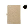 Light yellow fabric journal with rounded corners, elastic closure, pen holder, and dual bookmarks—paired with an illustrated fountain pen and floral 'joie' logo