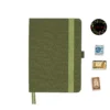 Olive green fabric-covered notebook with rounded corners, matching elastic band, pen loop, and dual ribbon bookmarks, displayed alongside three vintage postage stamps and a floral 'joie' logo