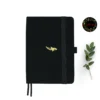 Orca A5 Dot Grid Notebook with black cover and gold illustration