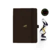 A5 dot grid notebook with a playing cat illustration on the cover