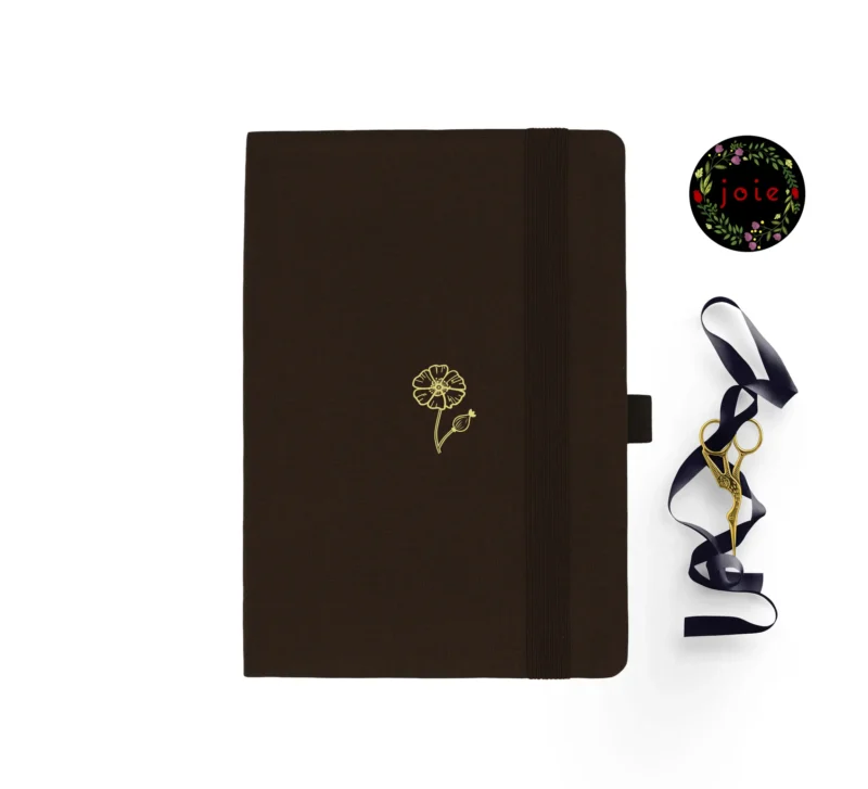Poppy A5 Dot Grid Notebook with floral design and accessories