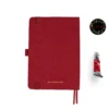 red fabric color notebook with round corners, red elastic band and red pen holder, two red silk bookmarks