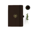 A5 dot grid notebook with sun and moon design on cover