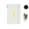 A5 dot grid notebook with solar system design on cover