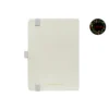 White A5 faux leather dot grid notebook with white elastic band, pen loop, Joie floral logo, and illustrated fountain pen
